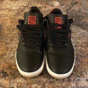 Men used puma black and red leather